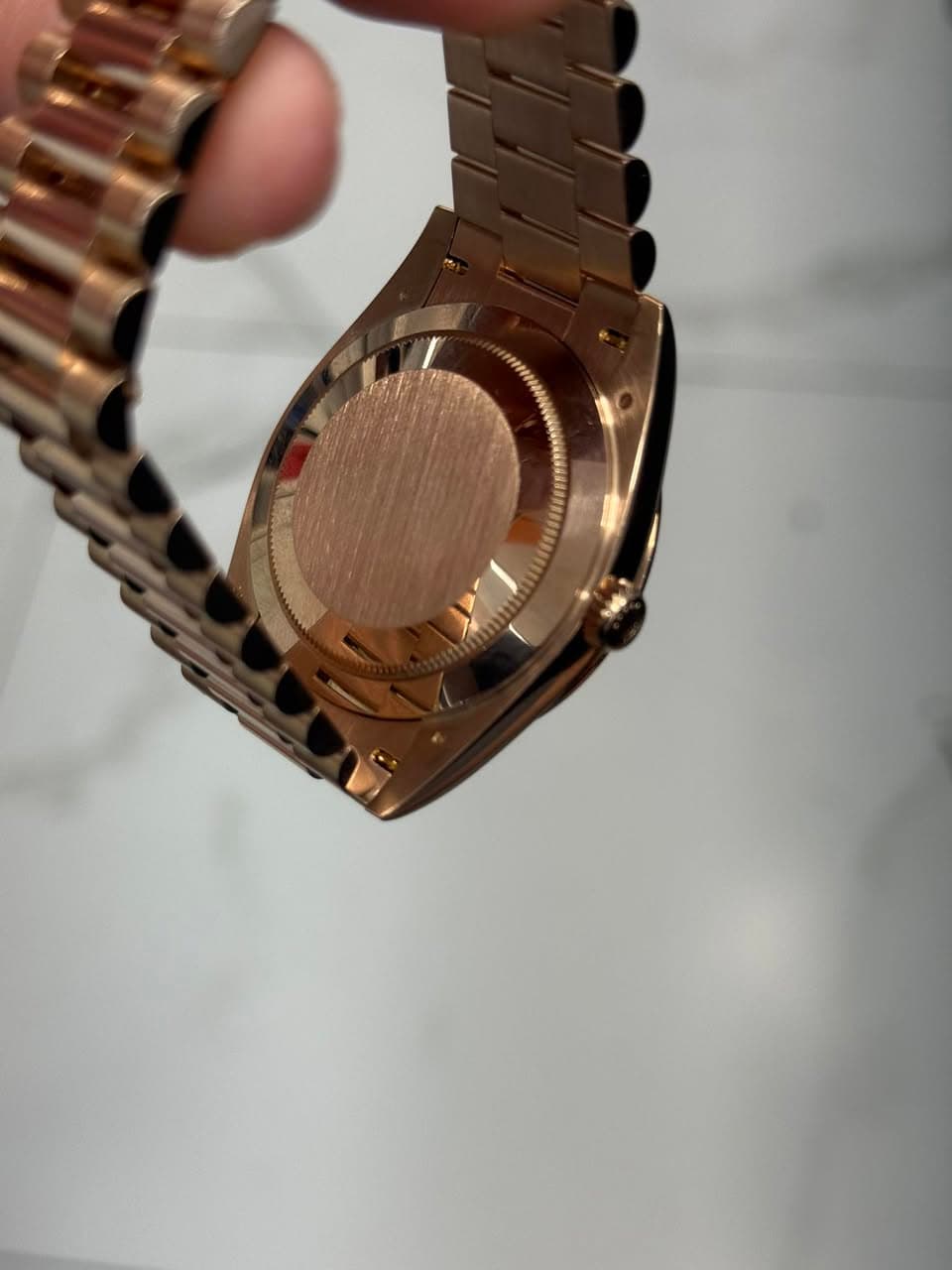 May be an image of wrist watch