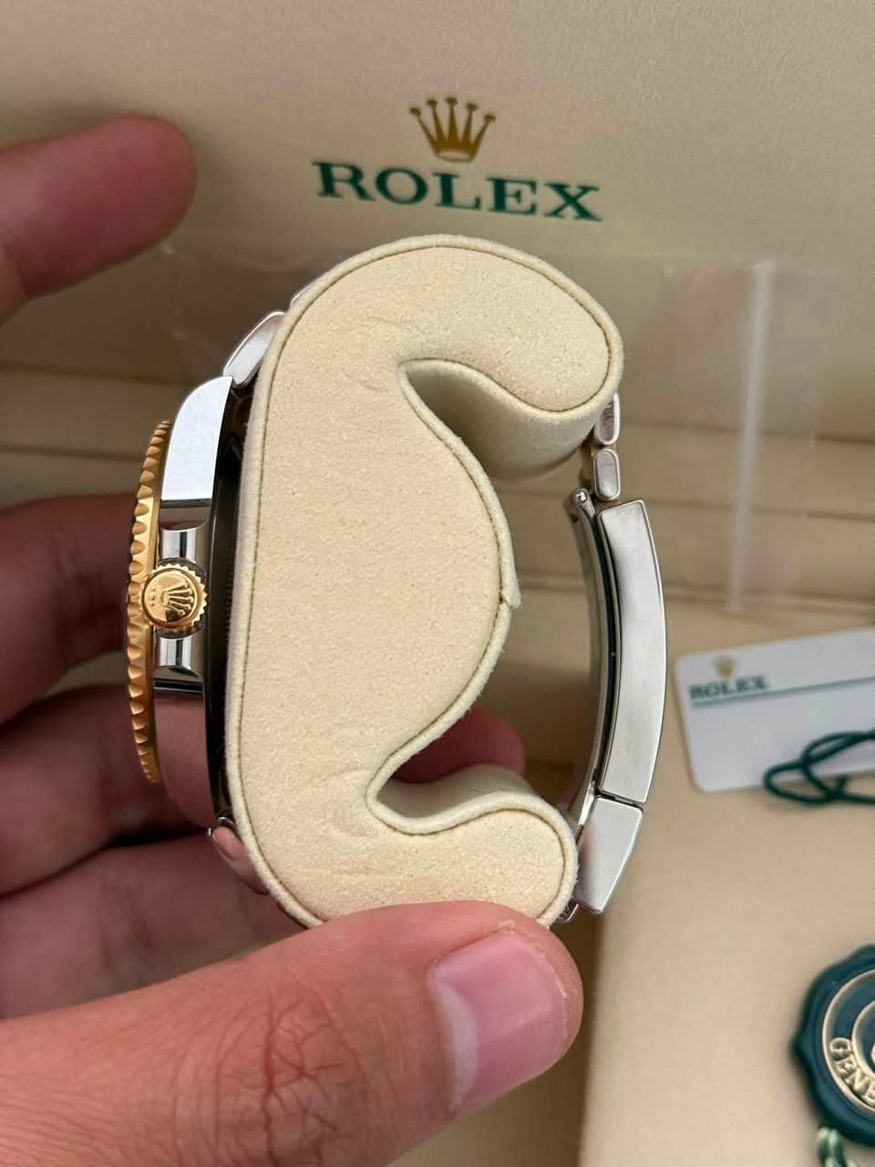May be an image of wrist watch and text