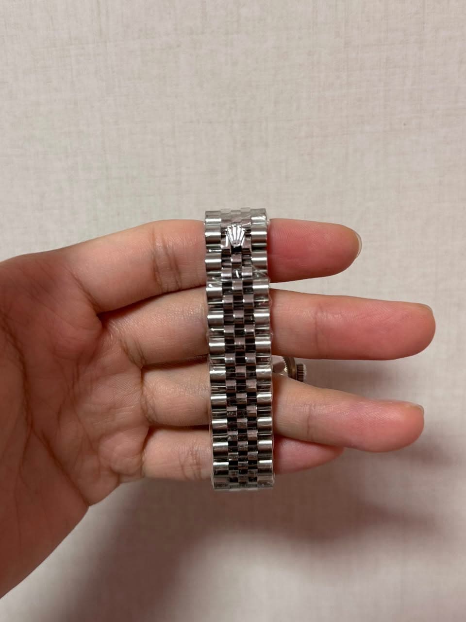 May be an image of wrist watch