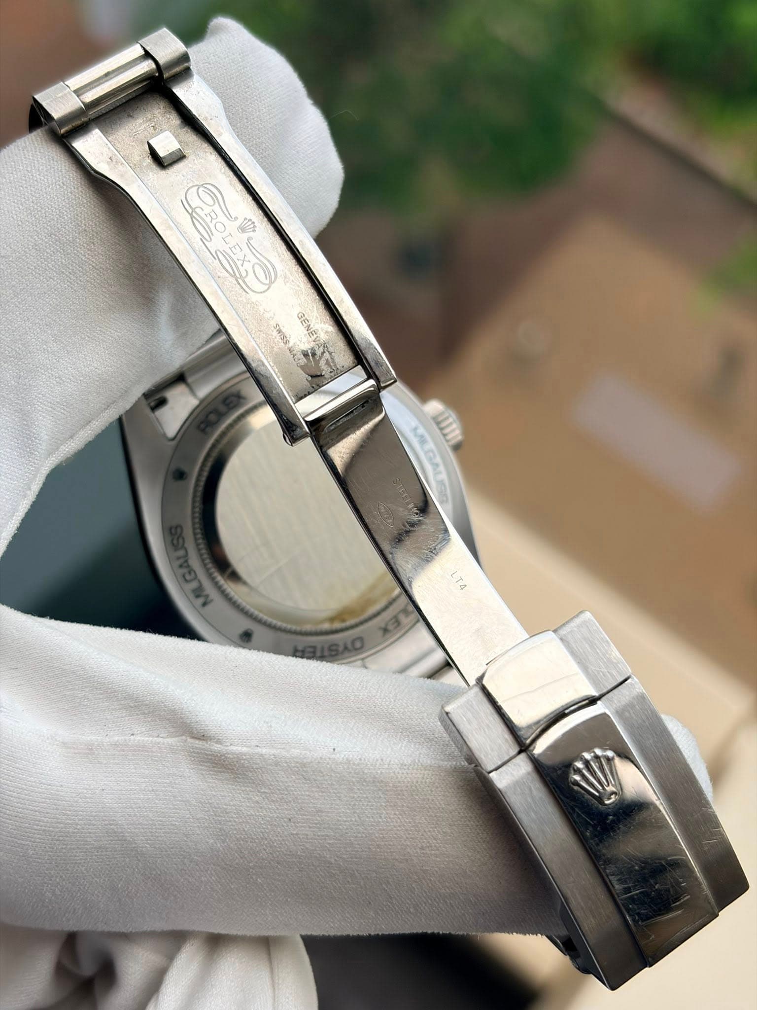 May be an image of wrist watch and text