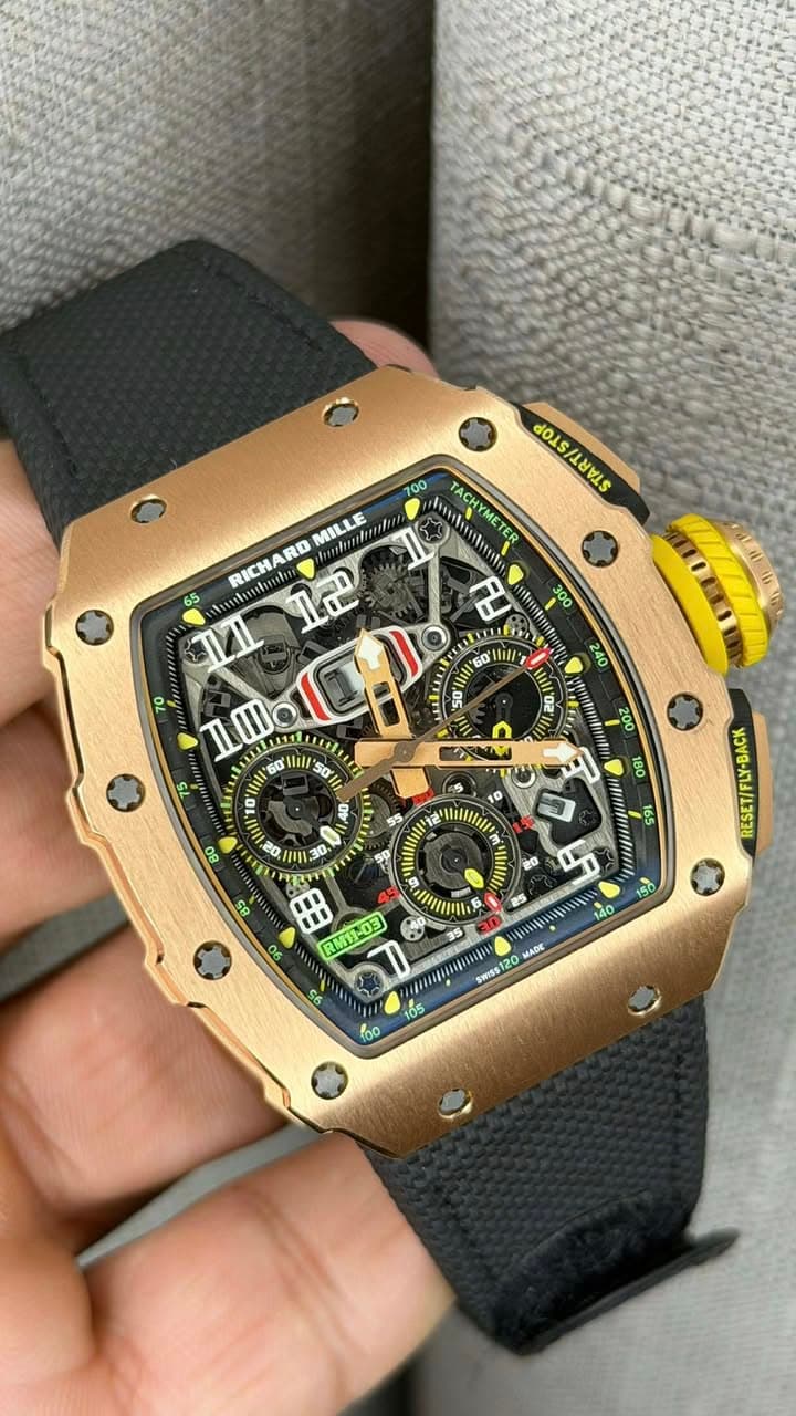 May be an image of wrist watch and text