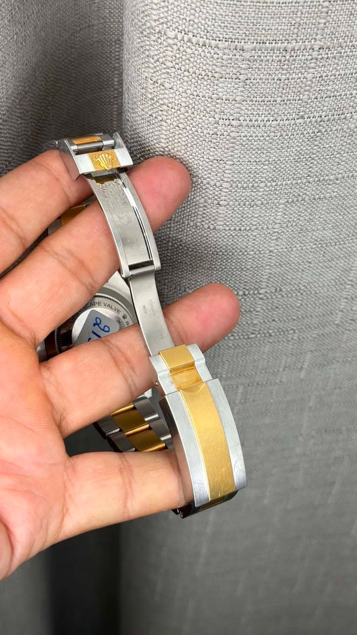 May be an image of wrist watch