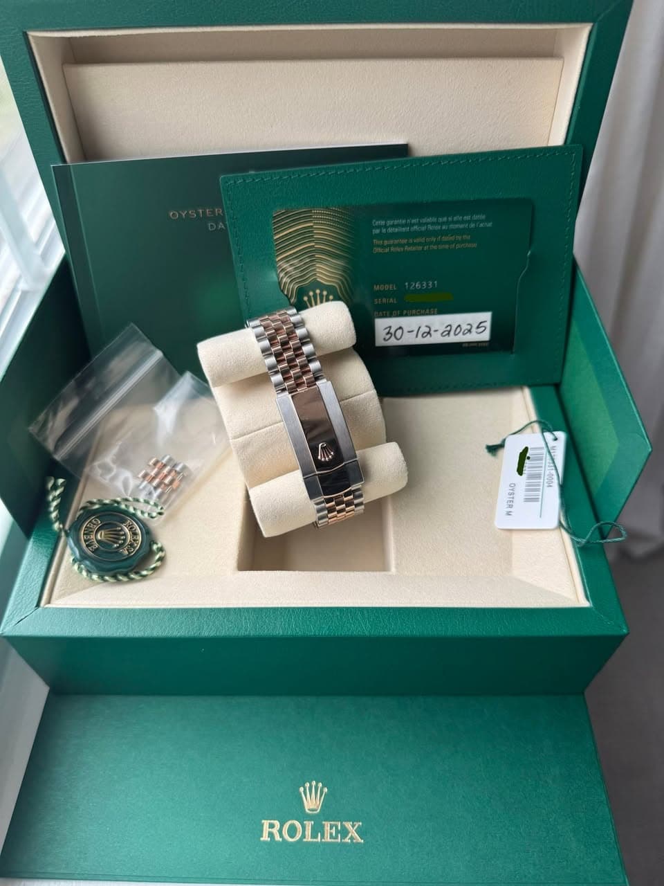 May be an image of wrist watch and text that says ' -20a5 มด ROLEX'