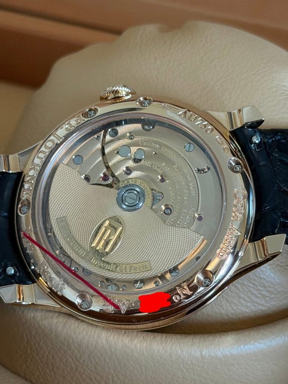 May be an image of wrist watch and text