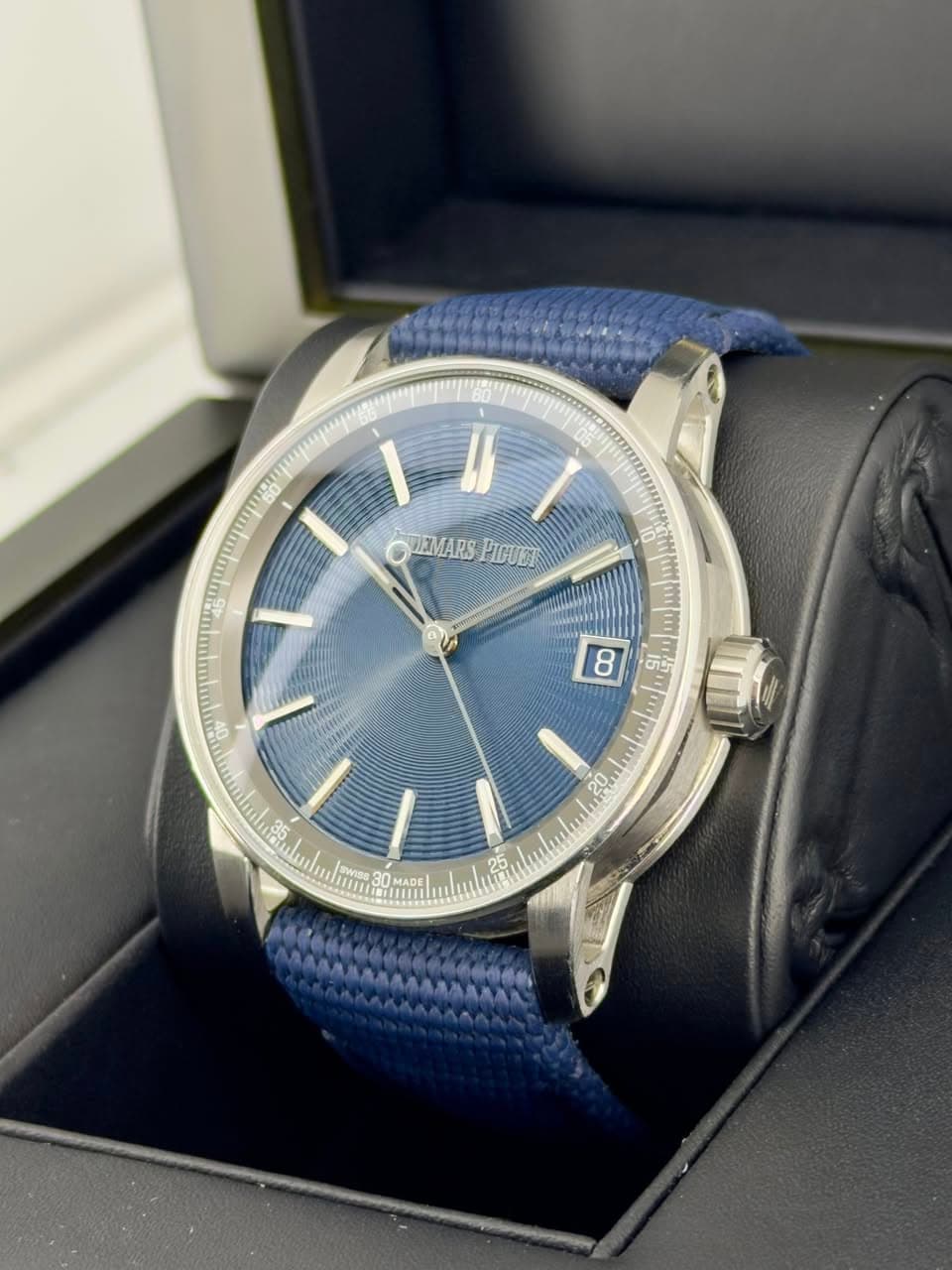 May be an image of wrist watch and text