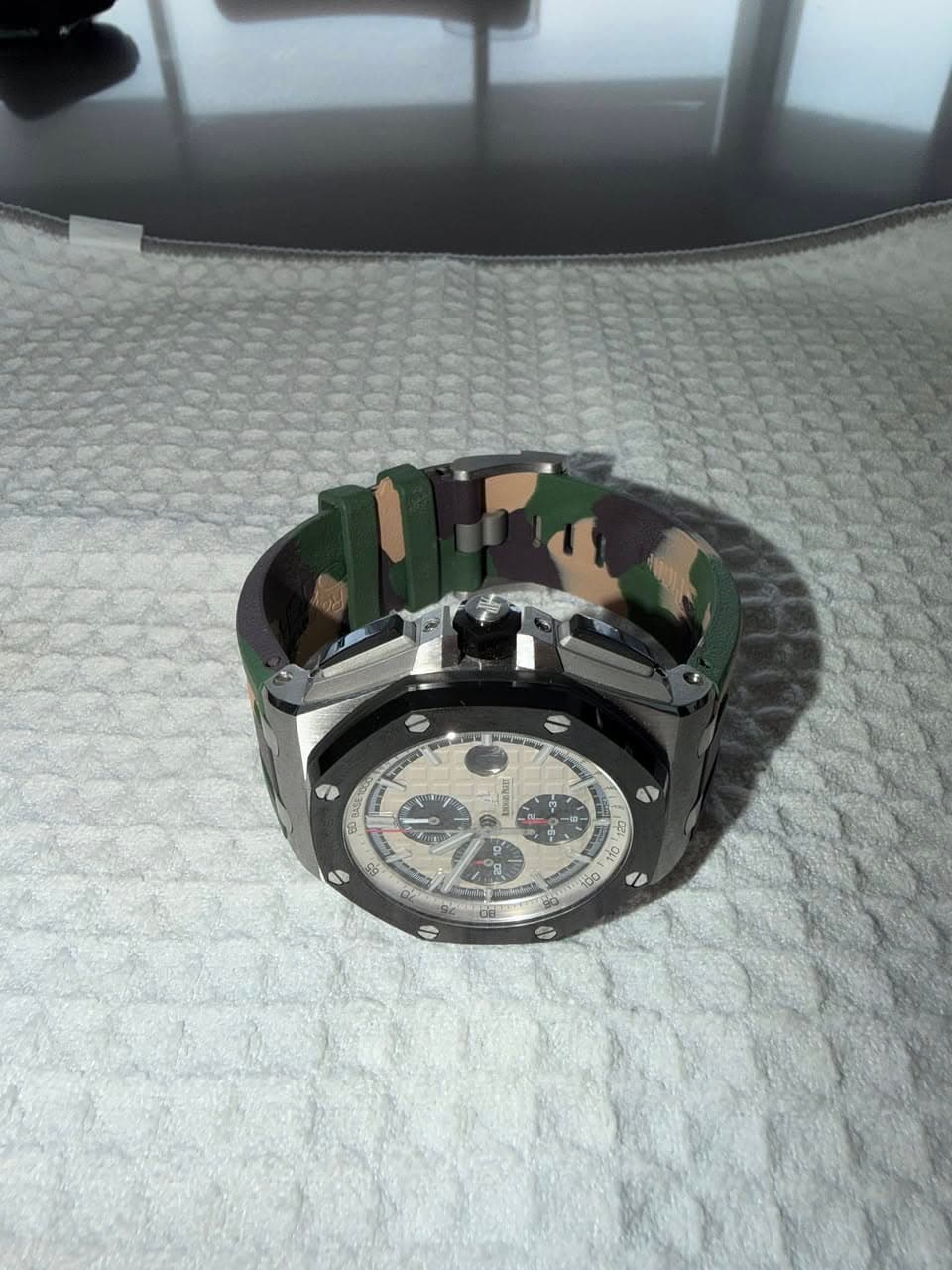 May be an image of wrist watch and text