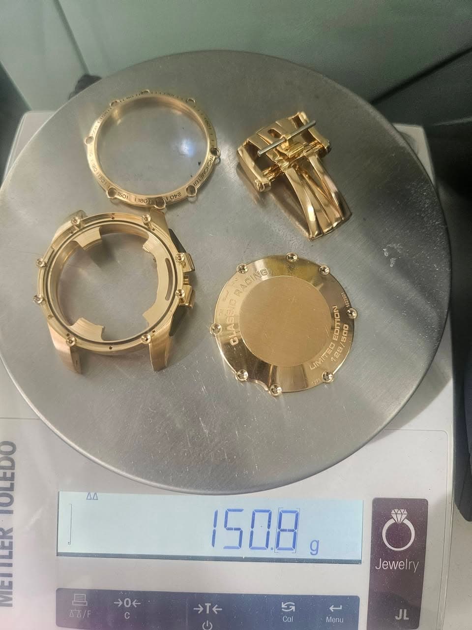 May be an image of jewelry and text