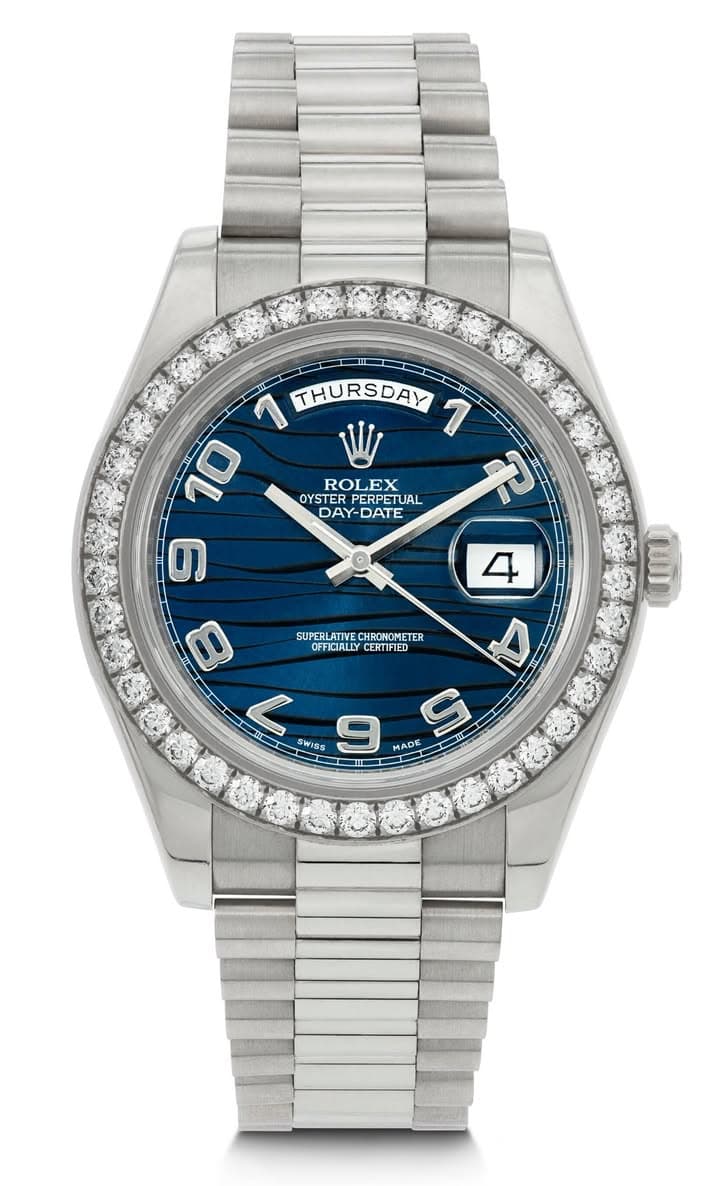 May be an image of wrist watch and text that says 'ROLEX OYSTER PERPETUAL DAY-DATE DAY DATE 1 THURSDAY 1 10 や 6 8 SUPERLATIVE SR CHRONOMETER OFFICIALLY CERTIFIED 4 L SWISS <99 9…