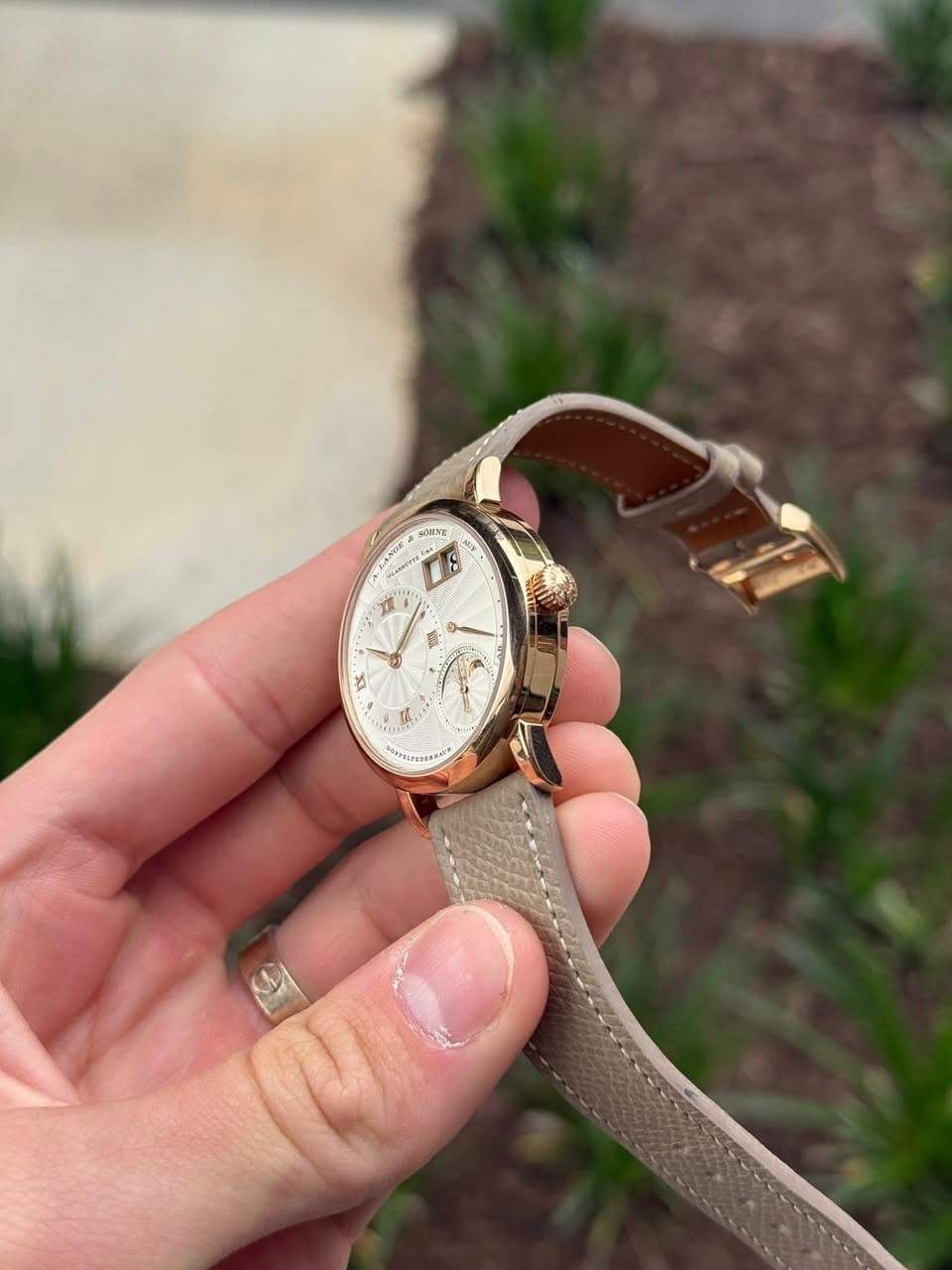 May be an image of wrist watch