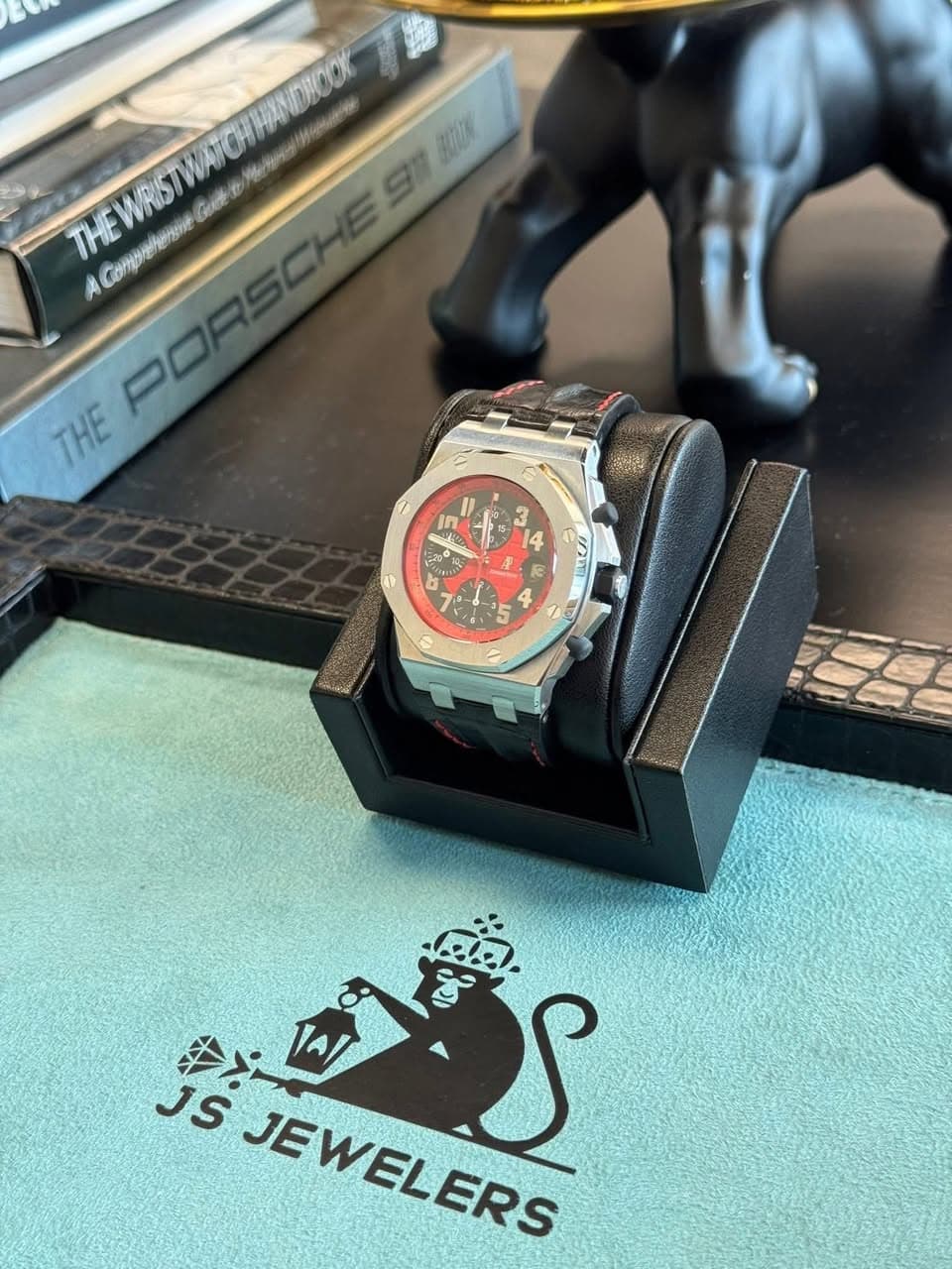 May be an image of wrist watch and text