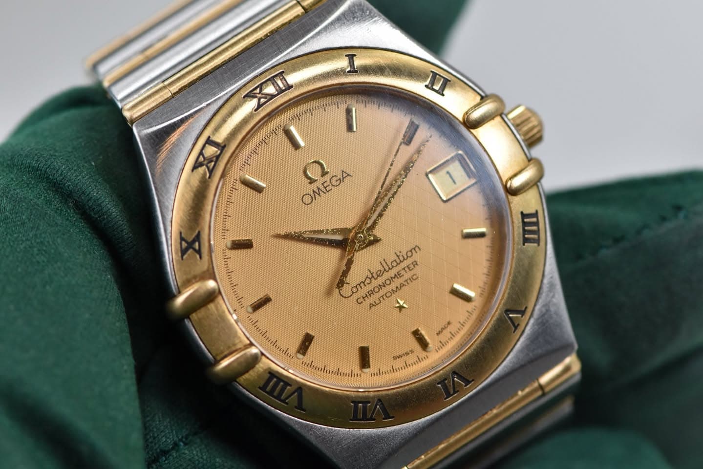 May be an image of wrist watch and text