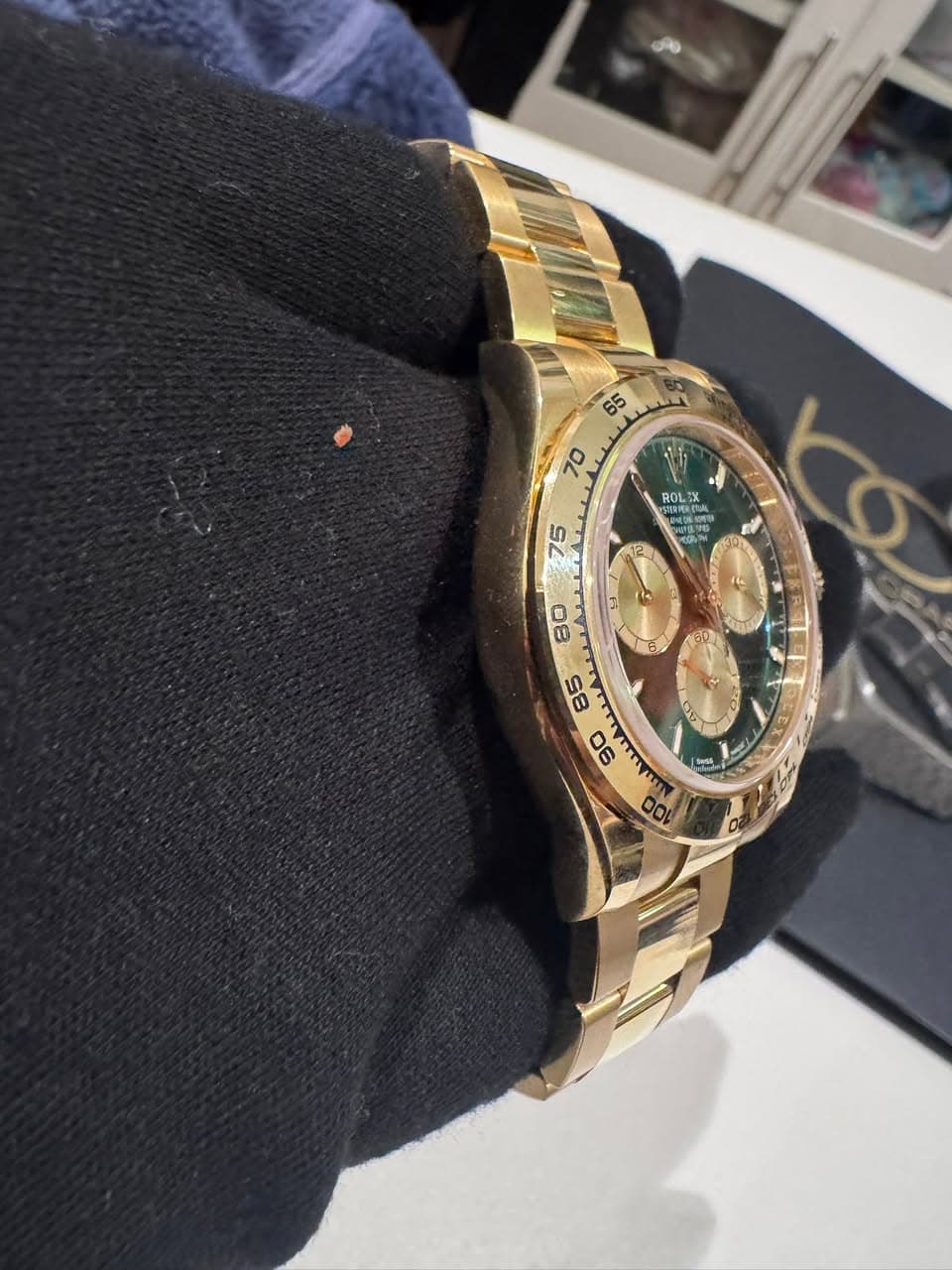 May be an image of wrist watch and text