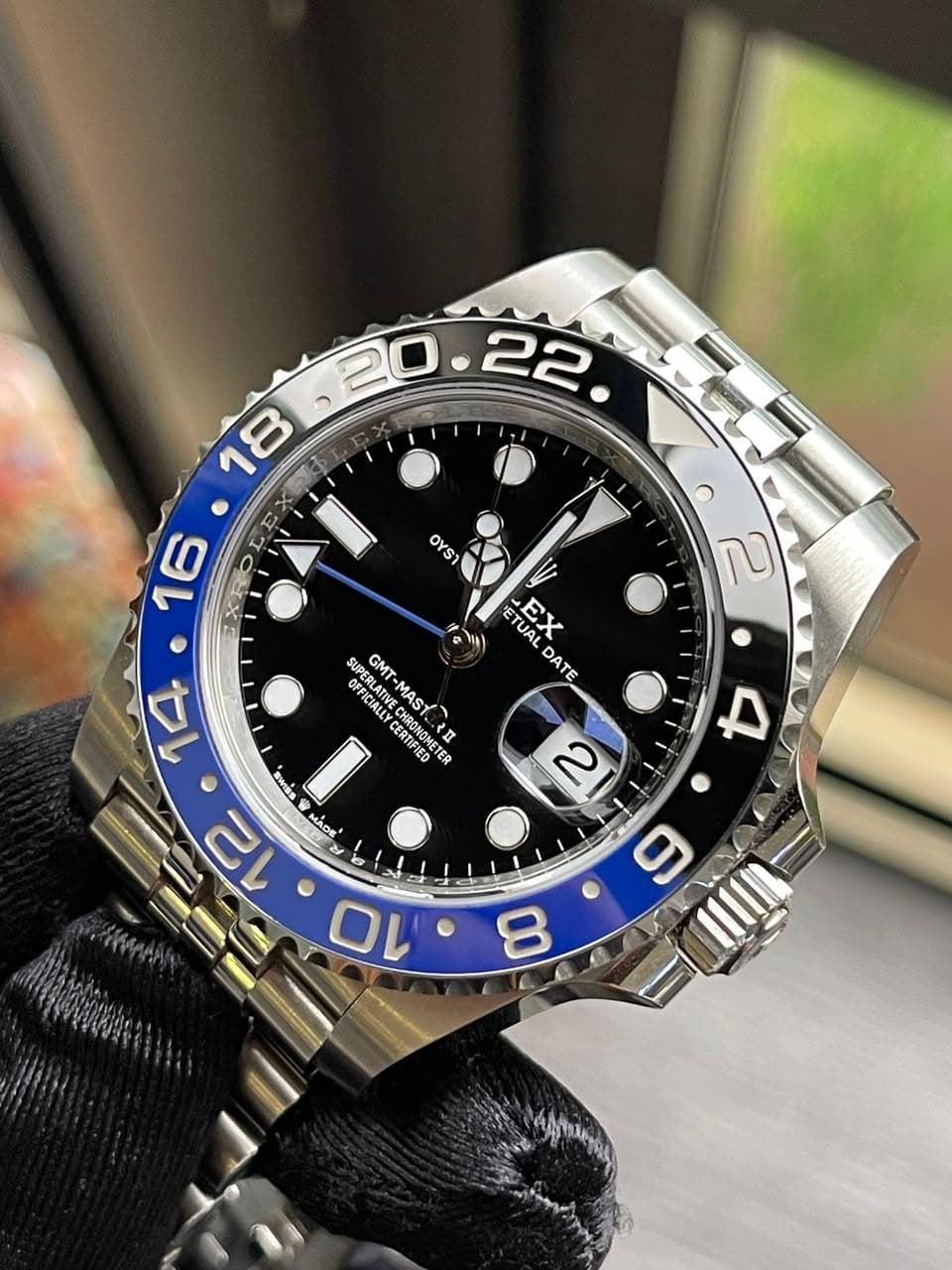 May be an image of wrist watch and text