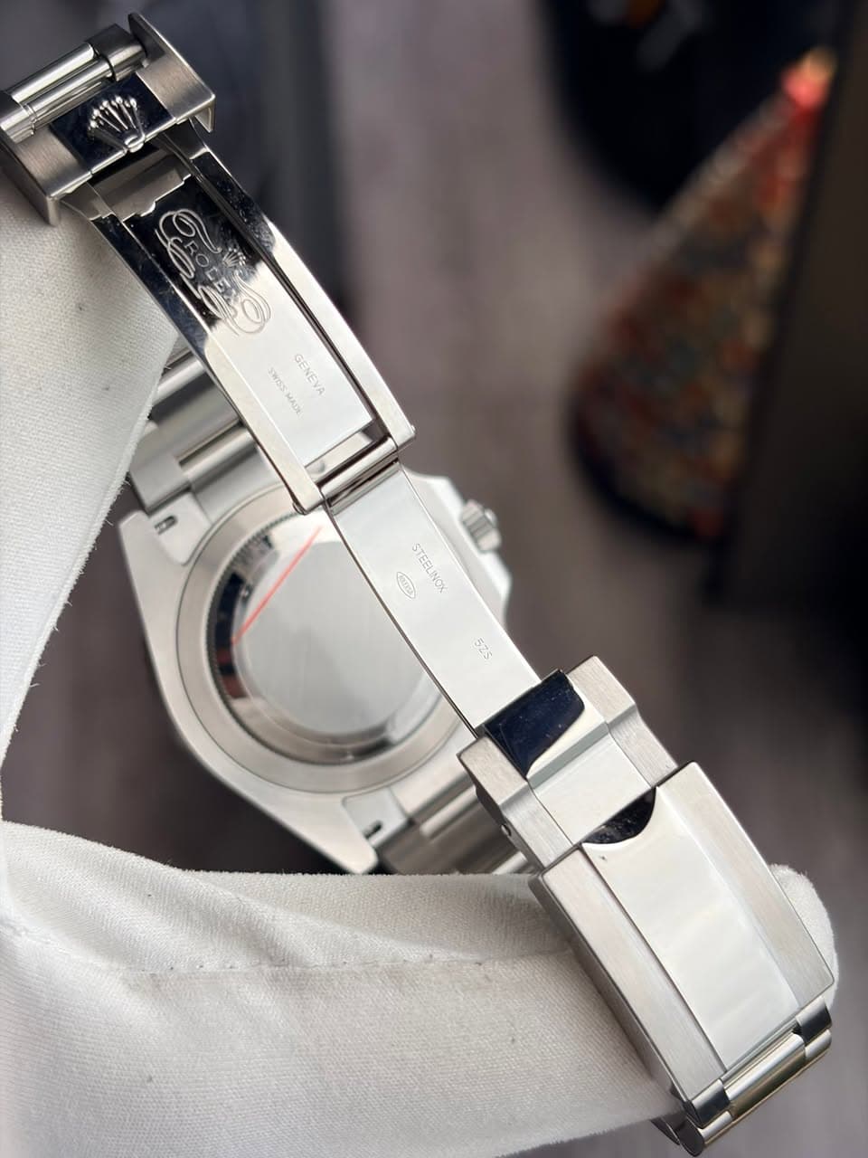 May be an image of wrist watch and text