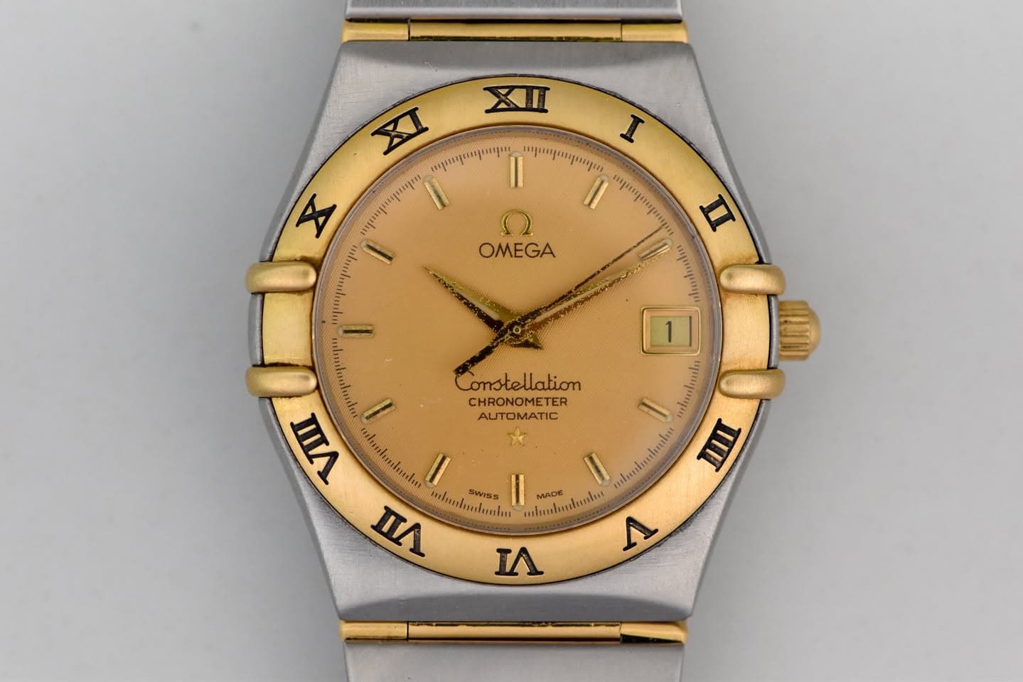 May be an image of wrist watch and text