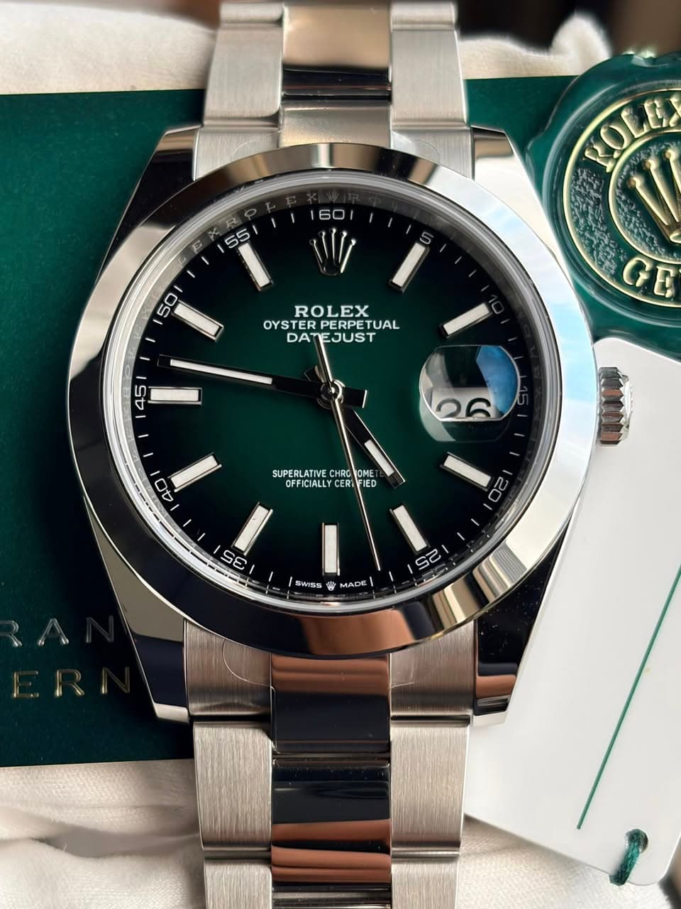 May be an image of wrist watch and text that says '160 55 POLE 50 ROLEX RO OYS OYSTERP TERPERPETUAL TUAL DATEJUST หก 45 0 GE 40 SUPERLATIVE CHRO OME OFFICIALLY SUPERLLLC CER IED 20…