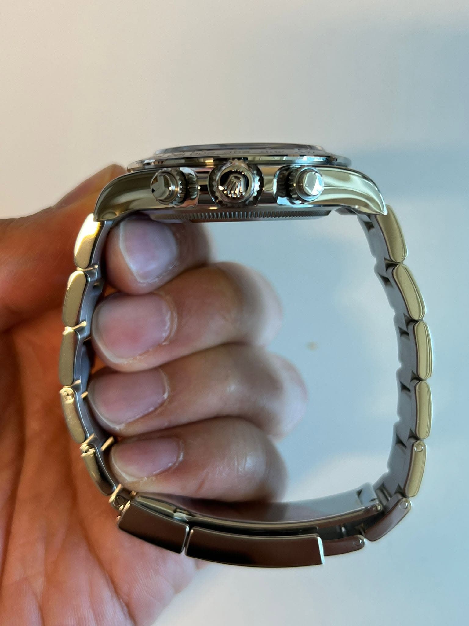 May be an image of wrist watch