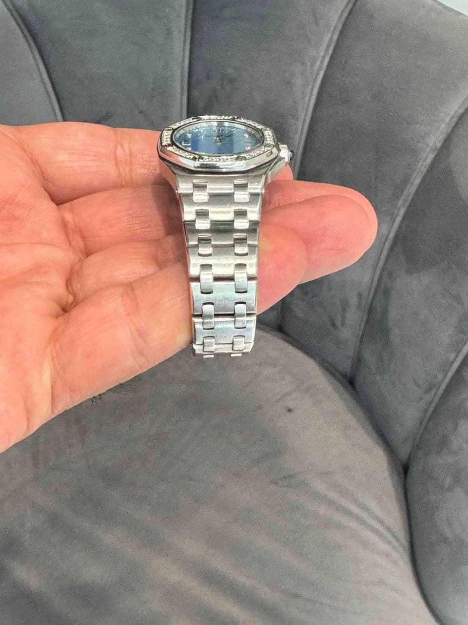 May be an image of wrist watch