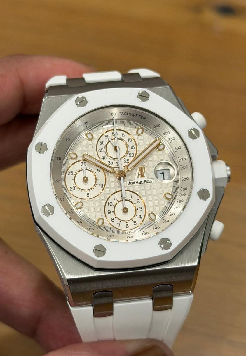 May be an image of wrist watch and text that says '60 TACH MRTM POITE 35 30 25 ١ ١ا 10 15 85 A 1 AUDEMARSPIGUET PIGUET B0 IIMRA ንነኛ '