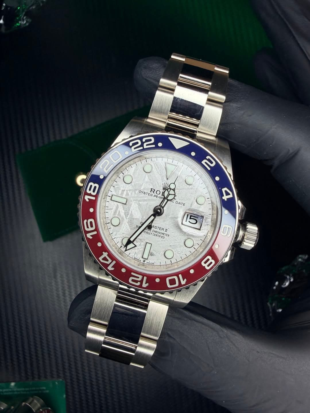 May be an image of wrist watch and text