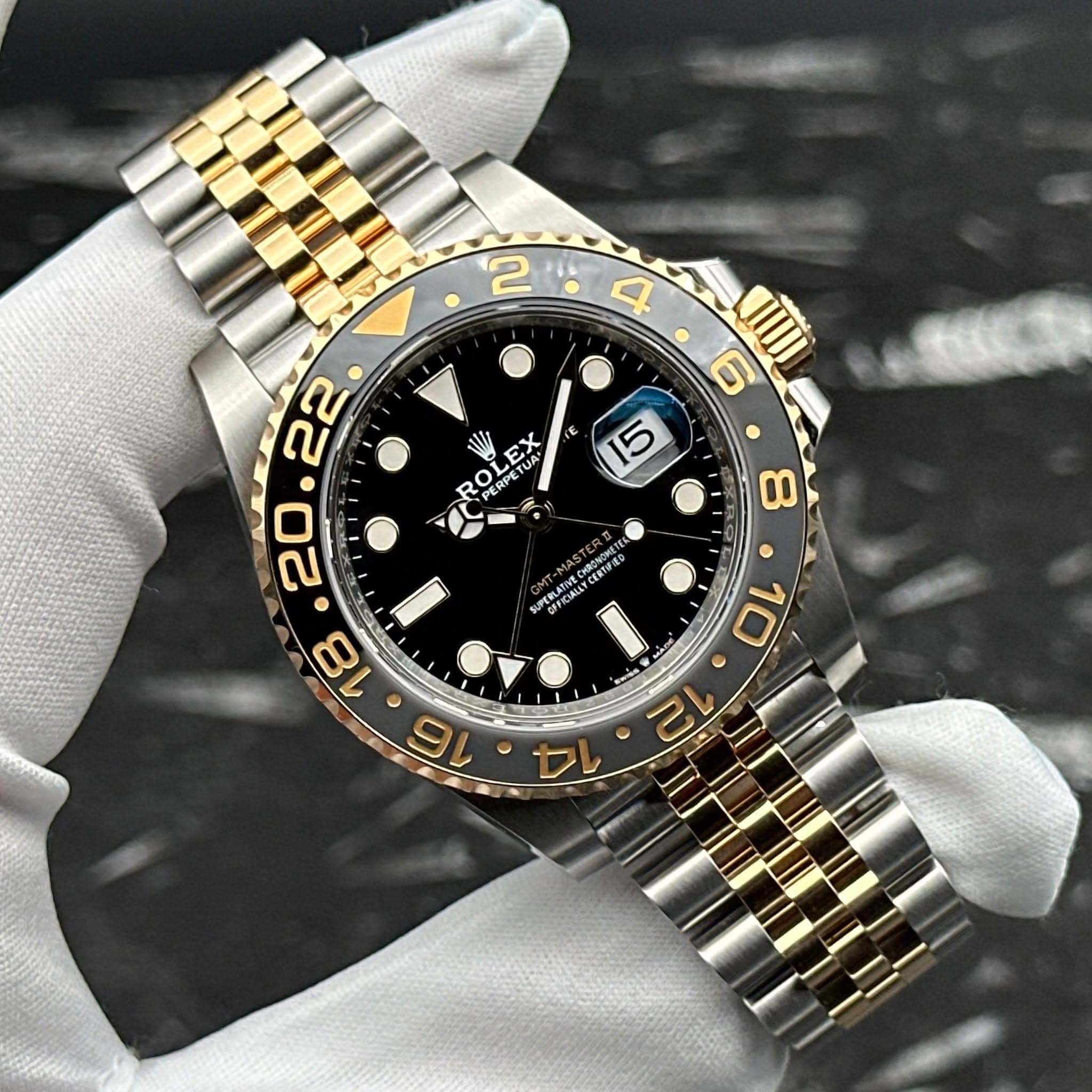 May be an image of wrist watch and text