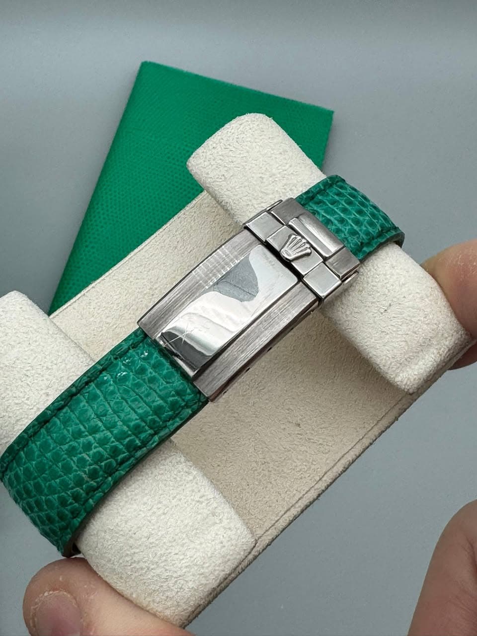 May be an image of wrist watch and saddle-stitched leather