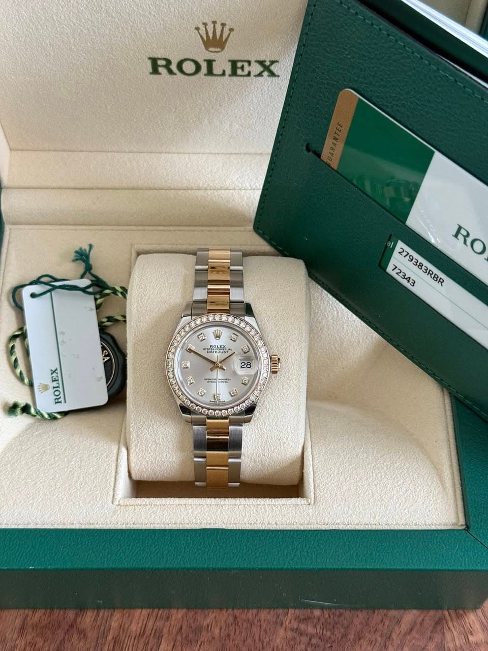 May be an image of wrist watch and text