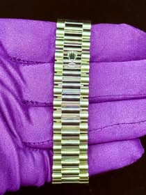 May be an image of wrist watch and jewelry