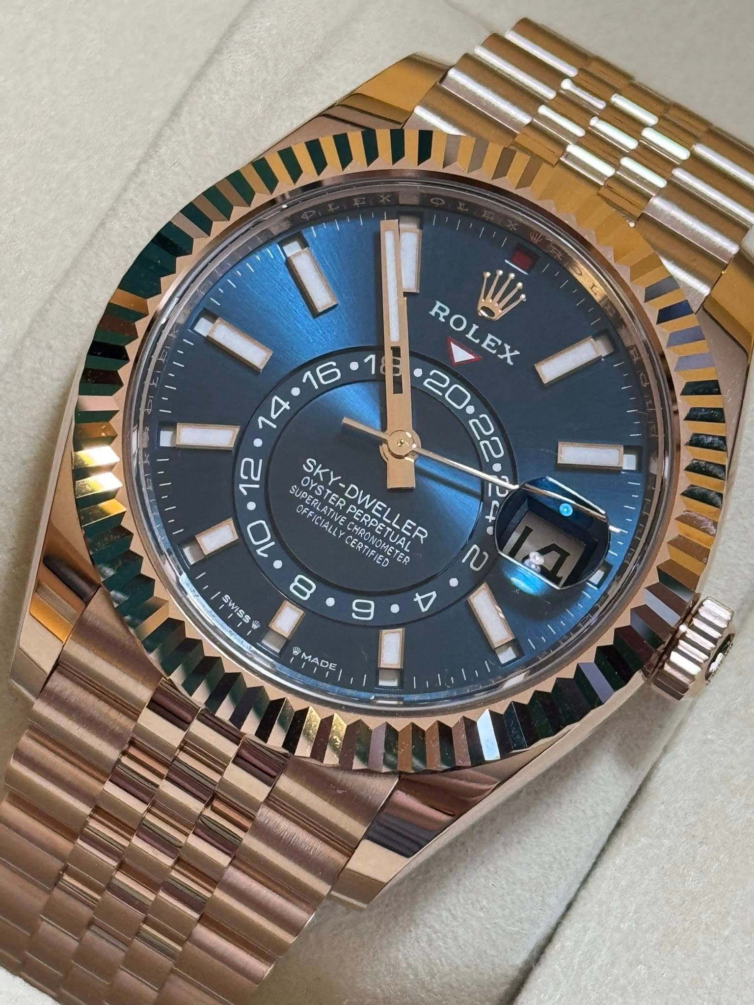 May be an image of wrist watch and text