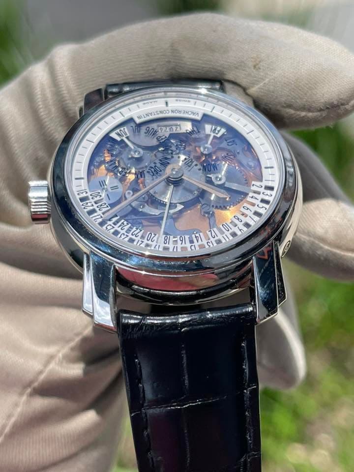May be an image of wrist watch and text