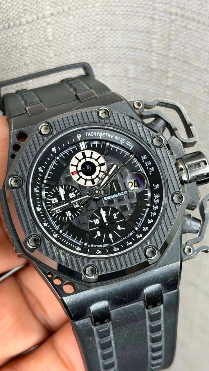 May be an image of wrist watch and text