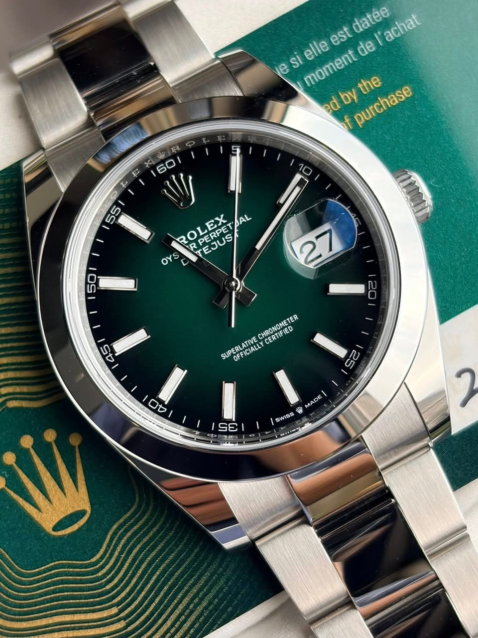 May be an image of wrist watch and text that says 'datee achat est de e SI elle moment ed edby by purchase the L ROLEX RPERPE ERPE TEJUS AL OY CHRONOMETER CERTIFIED SUPERLATIVE…