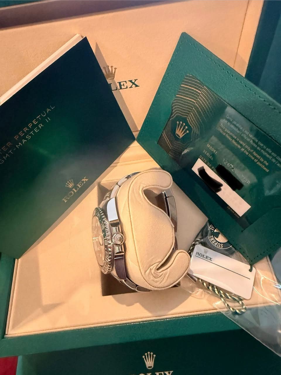 May be an image of wrist watch and text that says 'EX CEN Koeaiiant MODEL FOLEX W OLEX P UdUS ROL ROLEX EX'