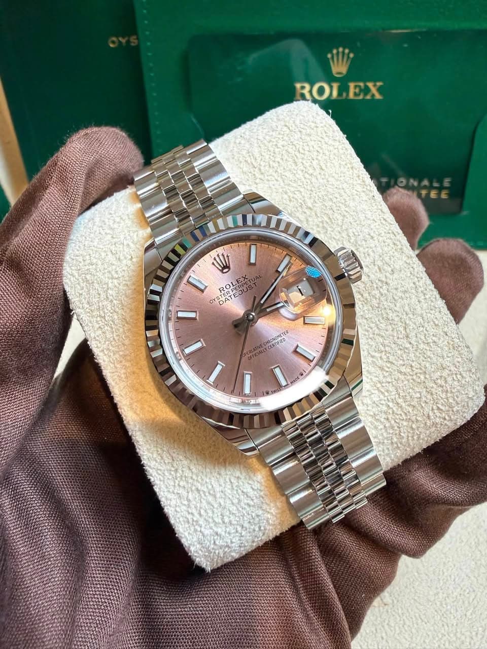May be an image of wrist watch and text