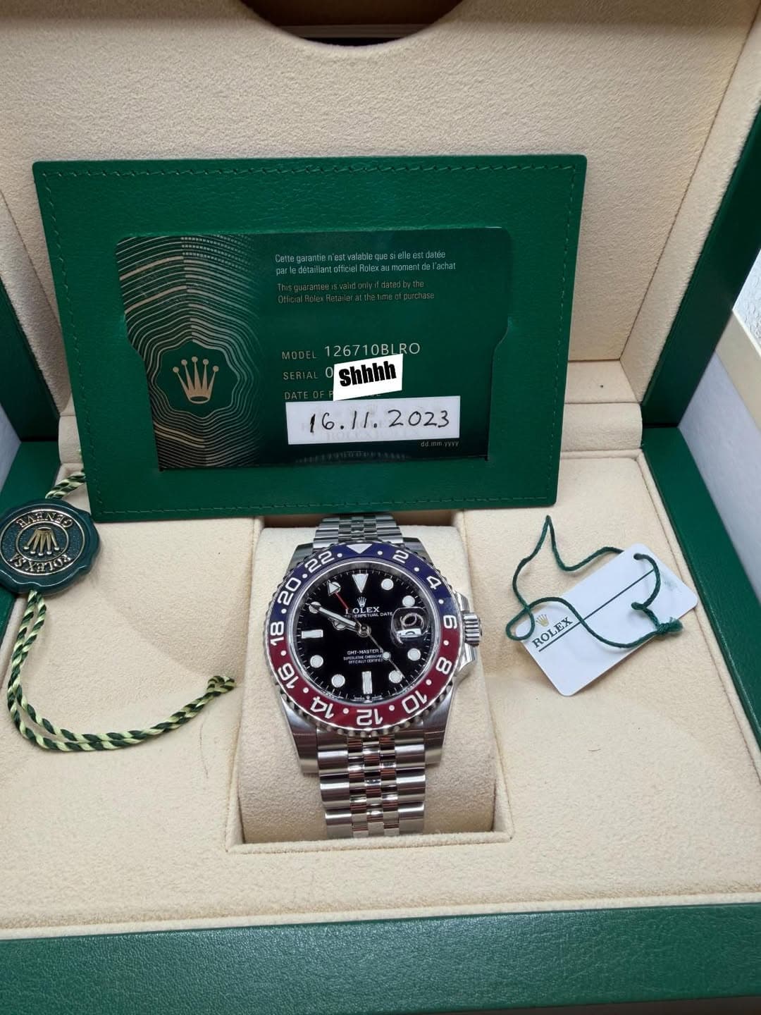 May be an image of wrist watch and text