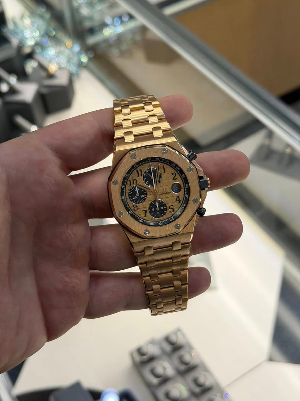 May be an image of wrist watch and text