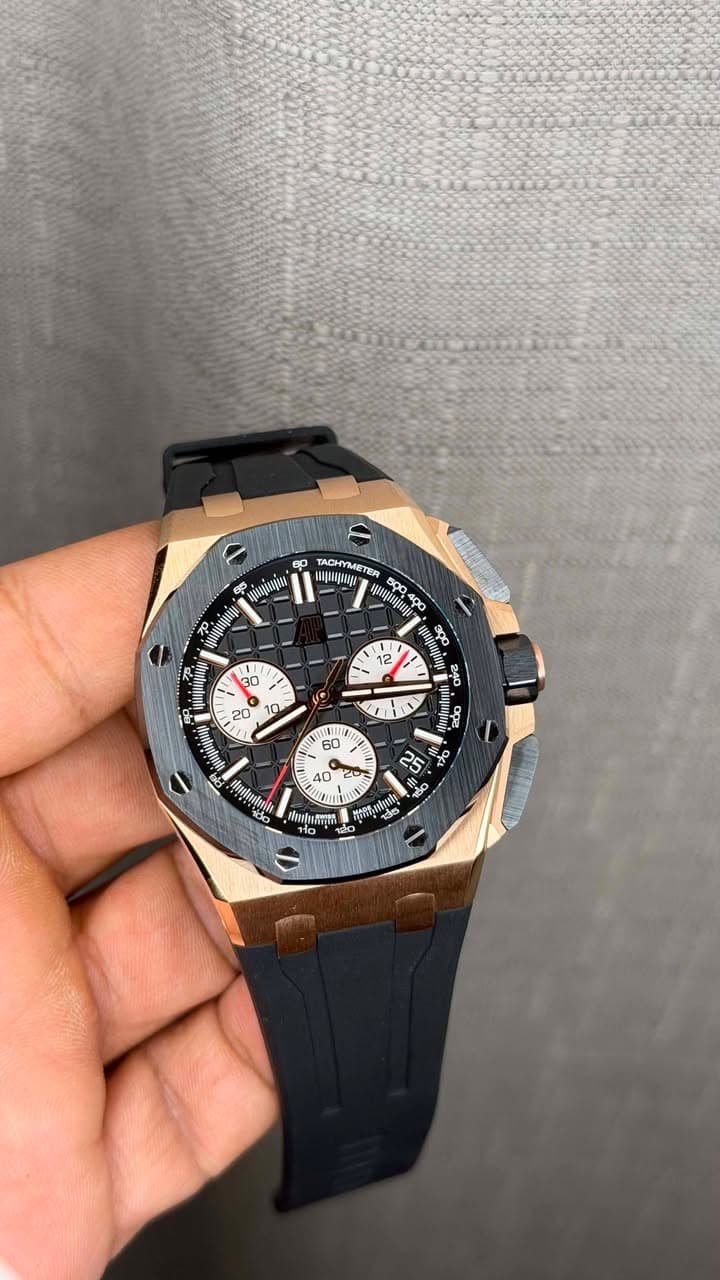 May be an image of wrist watch and text