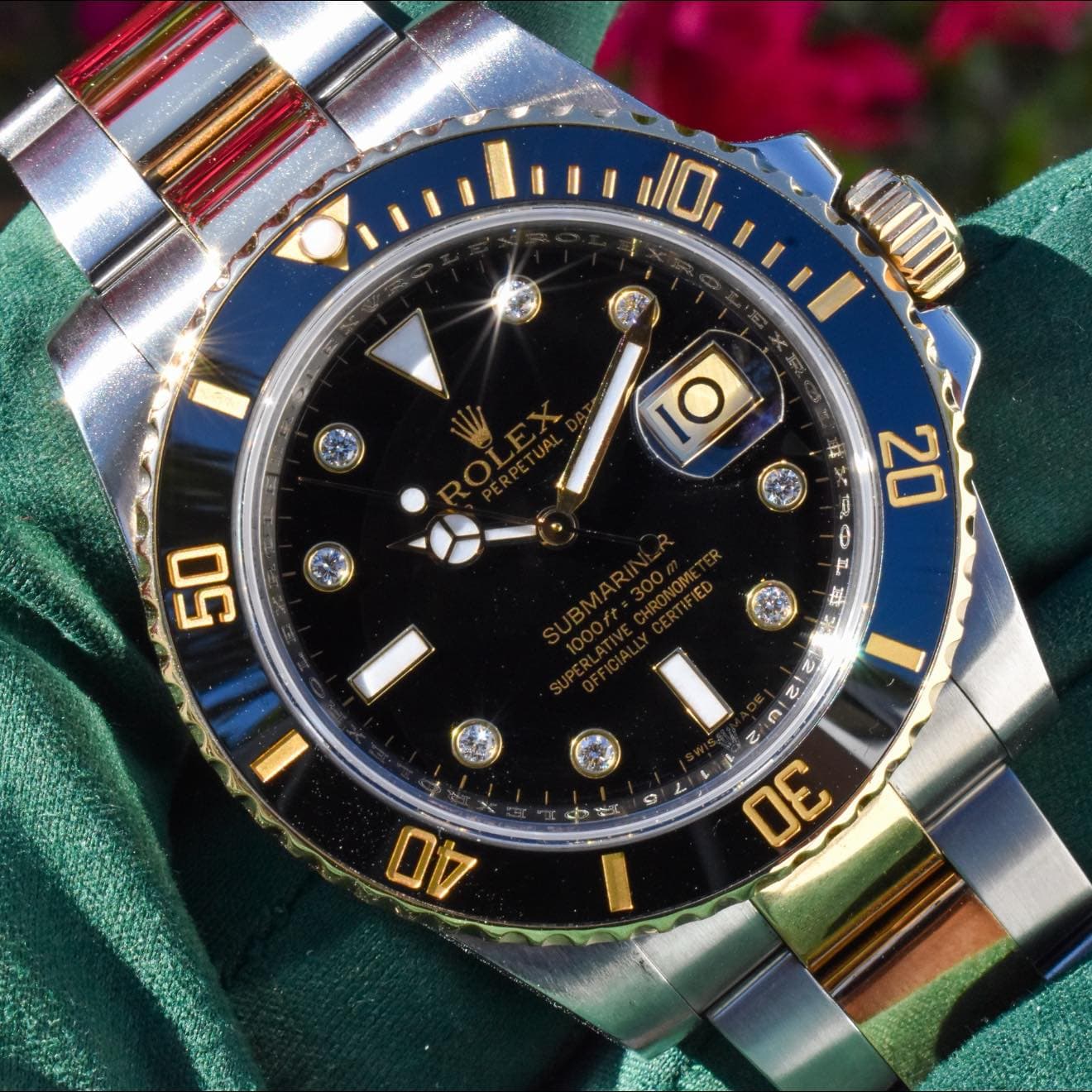 May be an image of wrist watch and text
