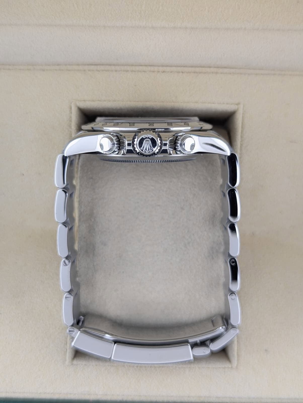 May be an image of jewelry, wrist watch and text