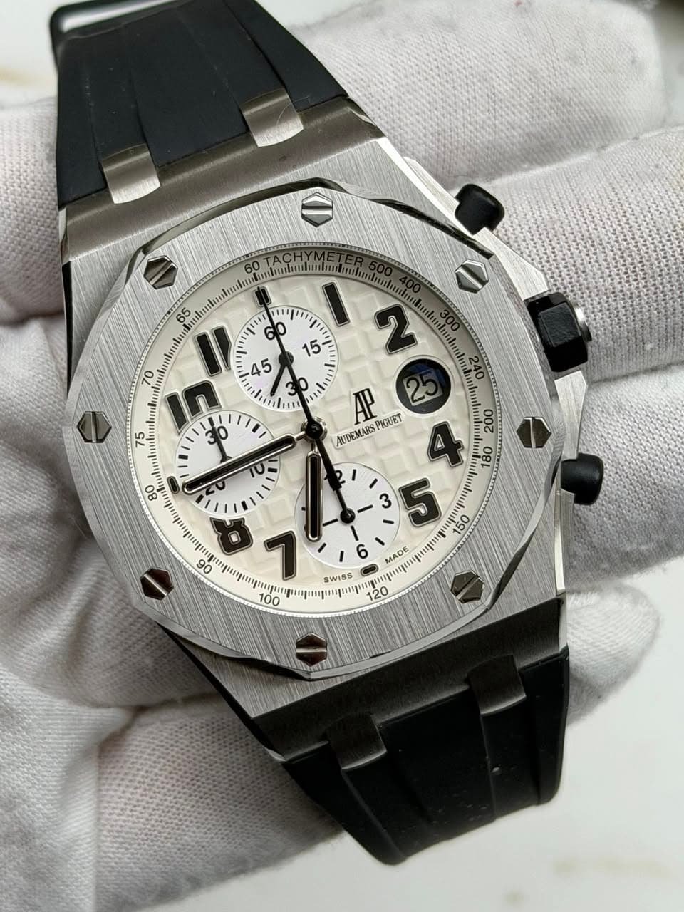 May be an image of wrist watch and text