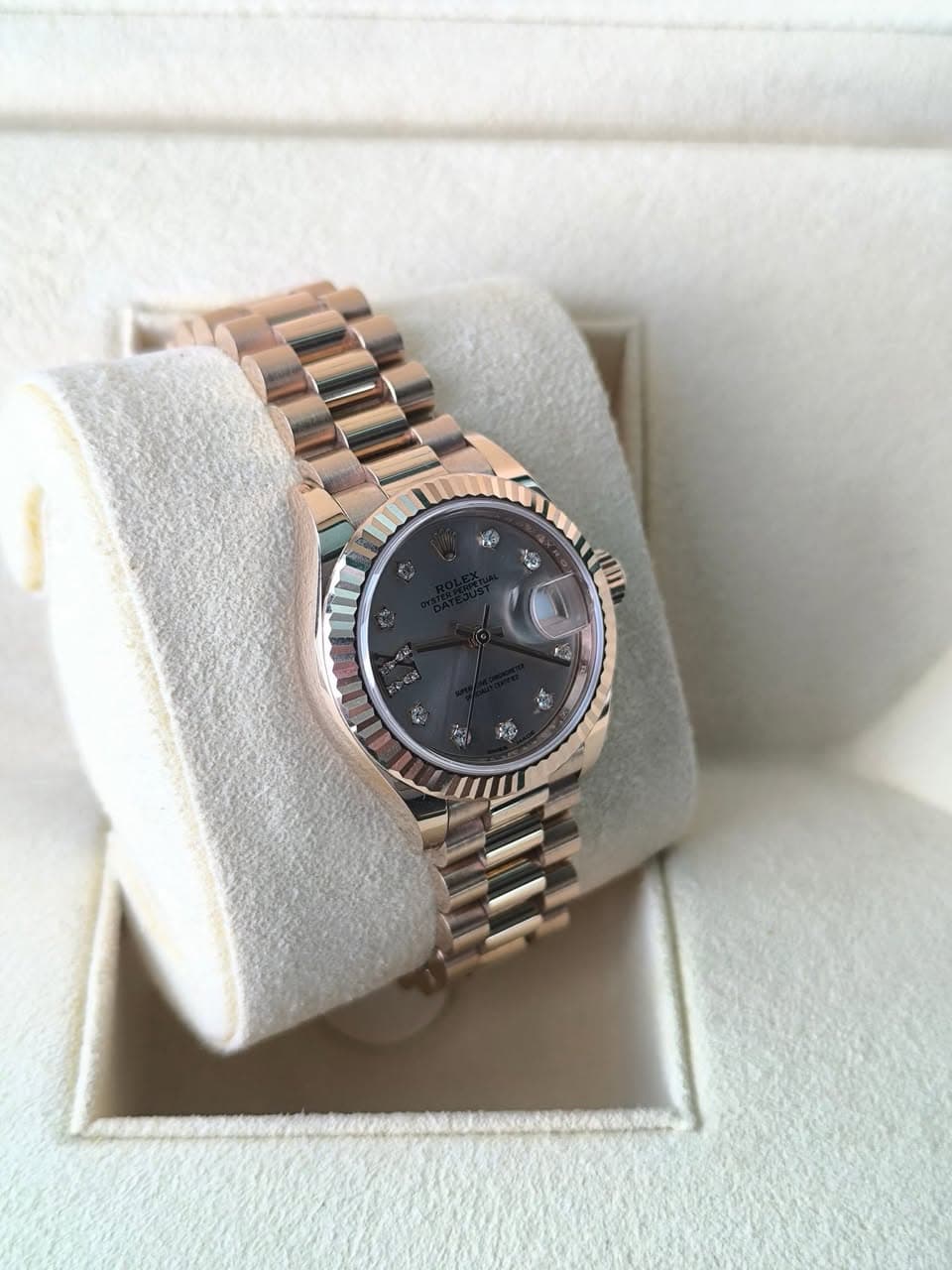 May be an image of wrist watch and text