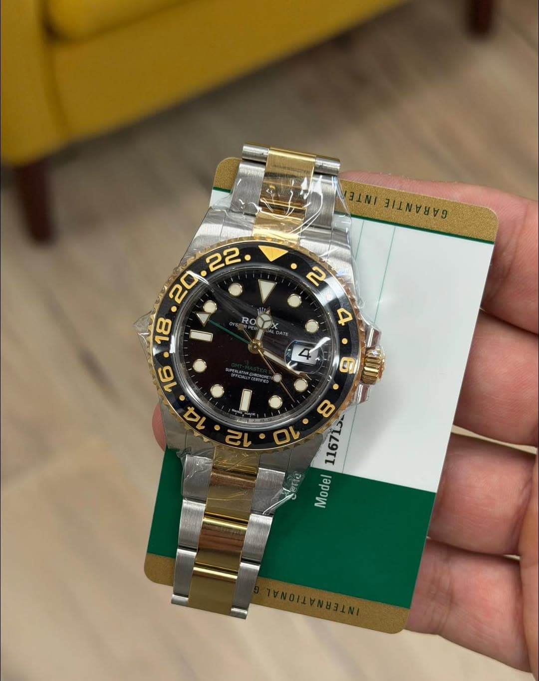 May be an image of wrist watch and text