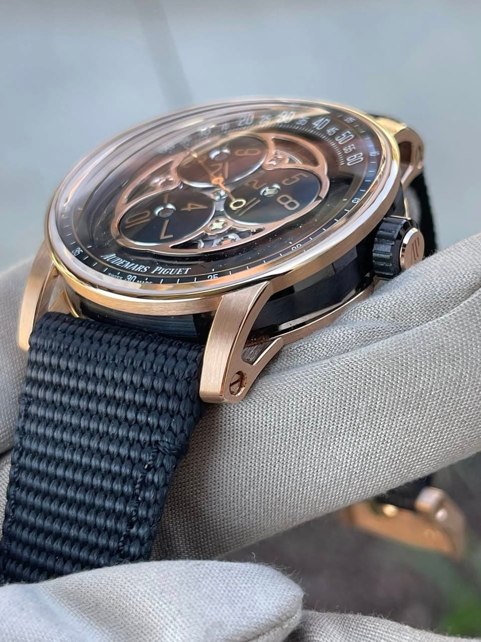 May be an image of wrist watch and text