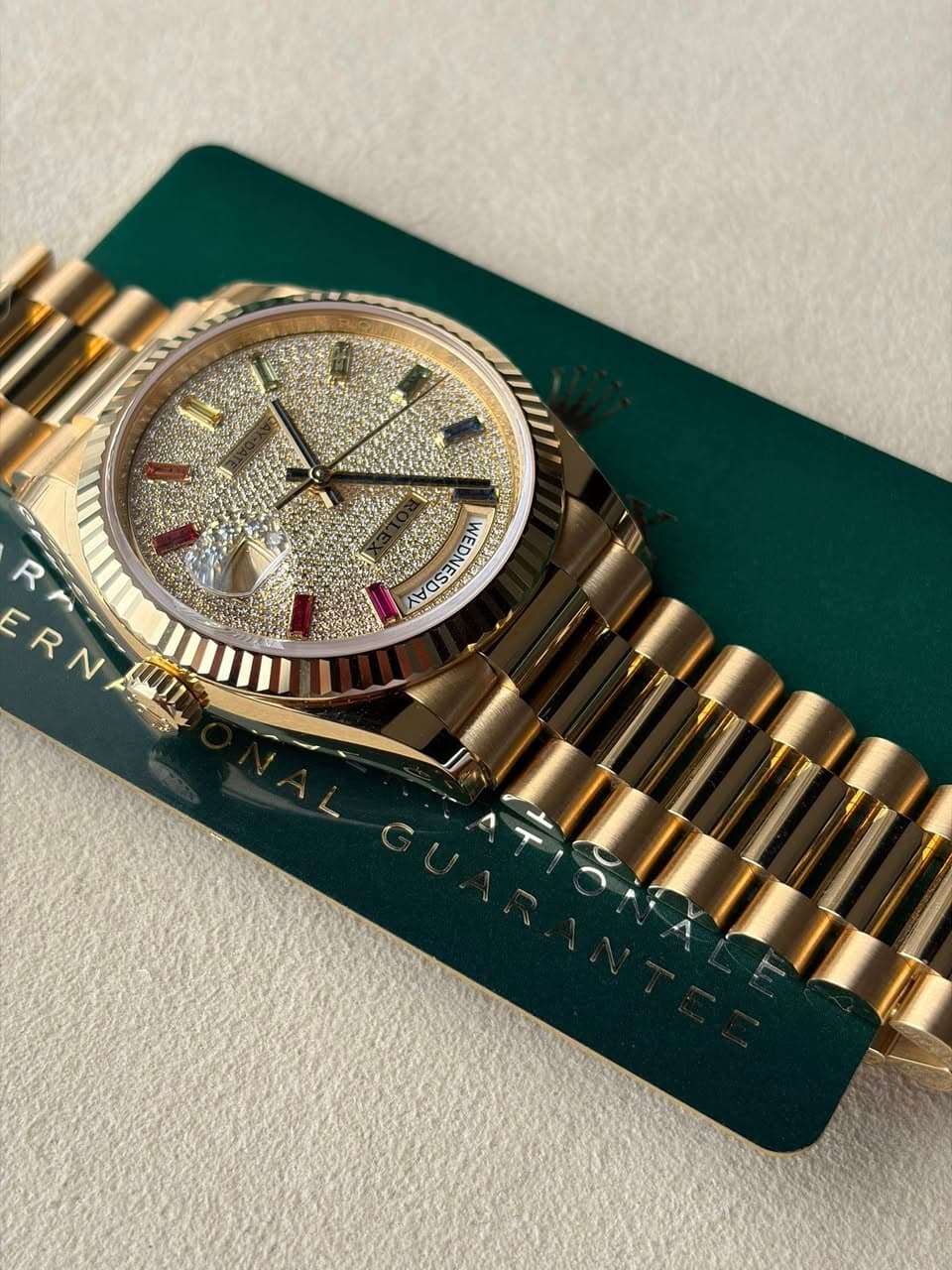 May be an image of wrist watch and text