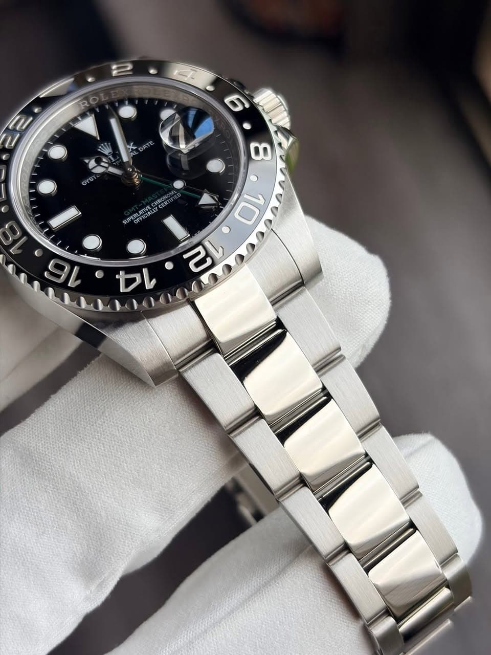 May be an image of wrist watch and text