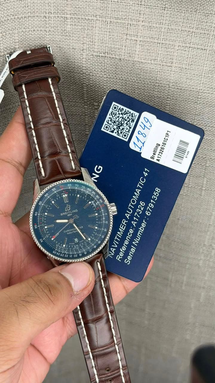 May be an image of wrist watch and text that says '口民定口 口記教き 11849 49 Breltling A1732616 17326161C1P 61C1P1 BT424 HIN NG N BR BREI TIC f A17326 NAVITIMER NA Reference: Refere…