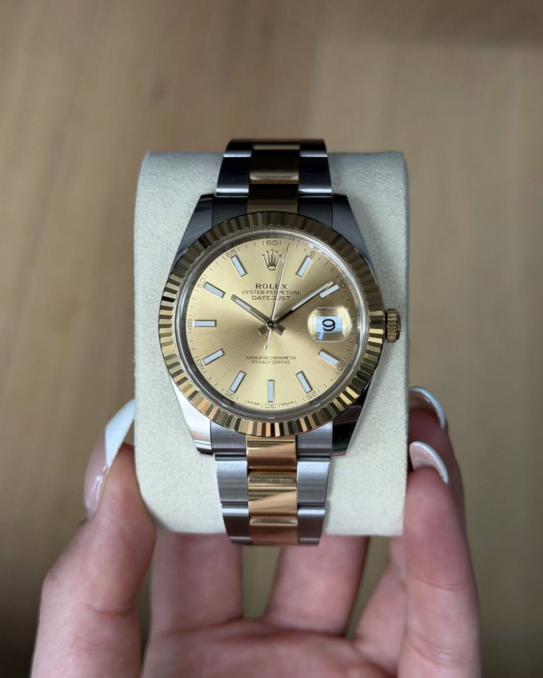 May be an image of wrist watch and text