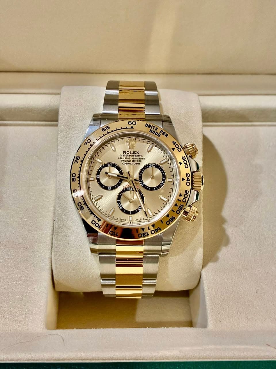 May be an image of wrist watch and text