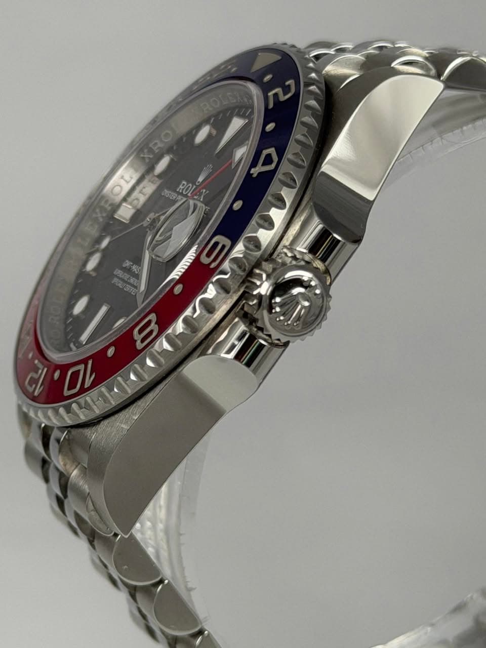 May be an image of wrist watch and text
