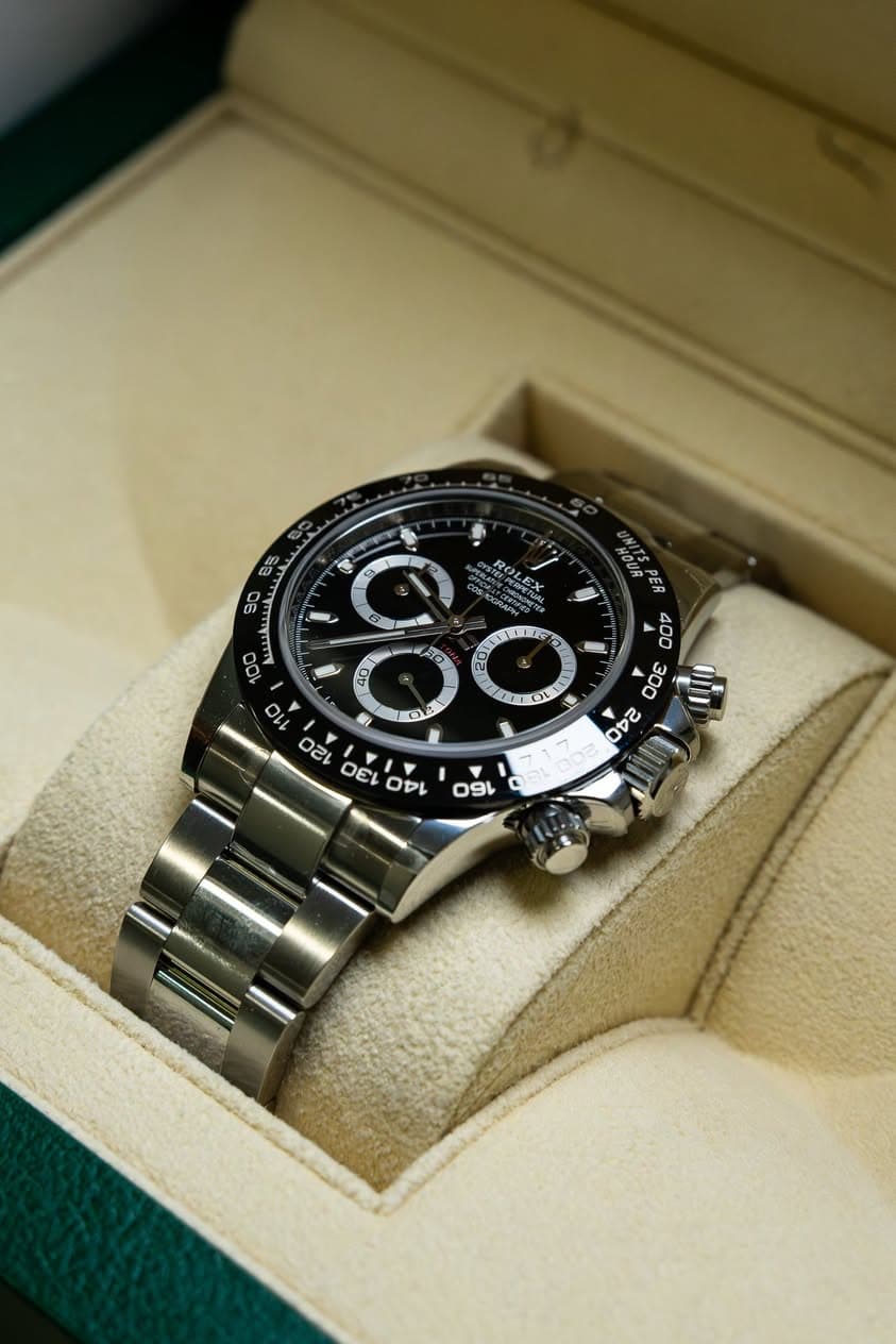 May be an image of wrist watch and text